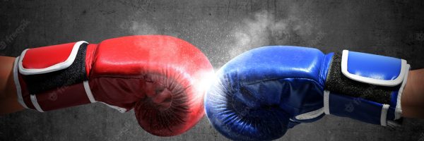 hands-two-men-with-blue-red-boxing-gloves-bumped-their-fists_9083-3393